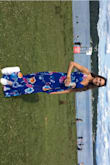 The colors are so pretty on this dress! I have to wear it with heels so it doesn't drag on the ground, but that's not a problem. You do have to tie it a bit tight to ensure your boobs don't pop out... I do really like it, and am looking forward to wearing it again when the weather allows! - Elizabeth S.