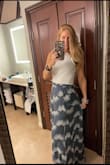 I decided to go with a white tank with this skirt and felt so flirty and cute - Caryn L.