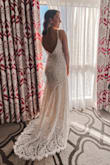I loved it, we had an elopement in Vegas and it was the perfect fit for me, I wanted to adjust the back as you can see in the picture I opened up the back myself and it looked a lot better and not as plain, I would definitely suggest it if you want to show off your back :) If you are looking to not spend a lot of money on a dress and still look amazing this is the one for you!! - Merdiana S.
