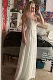 I got this dress for prom and it is stunning! It is a little bit long even when wearing 4inch heels. but nothing unmanageable. So excited about this dress. - Tatum C.