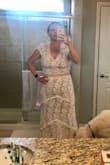 I bought this for our beach vow renewal. The minute I put the dress on I absolutely fell in love with it. I was surprised truthfully at the quality and fit given the price. I also require no alterations of any kind. I loved that I can either decide to expose a bit of my tummy or pull the skirt up just a bit if I'm not comfortable. I can't wait to wear this for our big event! - Megan D.