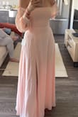 I loved this dress on the model, it's a burnt peachy color and I was really excited when I bought it, however, it came in a very light pink color. The size is perfect on the bust, and as a girl with wide hips it fit very well on that area as well. The sleeves don't fit the way it fits the model, I couldn't pull them up because they'd be in the middle of my arms. Just tall girl problems! - Leti F.