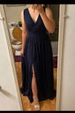 I actually fixed it to fit me a bit more, but I the fabric super comfy. Love the flow of the dress. - Trinitie W.