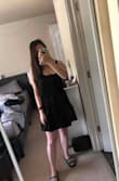 I think it's a great idea to get a size smaller. I read the other reviews about how it's quite low cut and how the straps felt long. I usually wear S but I got the XS since it's also got elastic around the chest. 
Fits great and I can't wait to wear it out - Jessica Y.