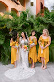 This dress is just as pretty in person as it is online. The wrap was very flattering on my 3 bridesmaids. I did have to hand sew the bust closed on two of my girls. The snap button did not hold and it was way too low cut. If you're busty definitely size up! I would say the dress runs a little small in the bust. I could have sized up on two girls but the dress still worked out by sewing it closed. Sizes on first photo, from left to right, M, XS, L. Could have ordered, M, S, XL. - Kenya S.