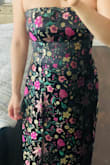 I've had this dress in my Loves List for weeks, but I've been hesitant due to other reviewers complaining about the fit. Most of my Lulus purchases have been smalls with a few medium size pieces depending on the fit (I like fitted, not tight). This dress does have a slightly odd fit in that the hips have a ton of extra room - fits like a medium, but the chest is snug.  I also still have a bit of post-baby belly and surprisingly the dress fits, albeit a bit snug but I can breathe in it.  

The dress is absolutely GORGEOUS!!! The embroidery is so intricate and I love the pink color on the inside of the dress. I cant wait to wear this! - Rebecca Z.