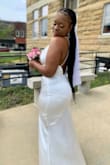 This dress shipped so fast and the material was buttery soft!! I love that it came in a reusable hanging bag to hang in the closet. The shipping was so fast too. This dress made me feel so sexy and confident, and hugged my curves so nicely. I'm so happy I made the decision to wear this dress. - Briana H.