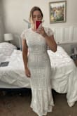The dress it a fitted dress. Looks better in person. Love the mermaid style! - Lacie B.