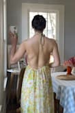 I could definitely take an XS in this but tbh I was too impatient to wait for it to come back in stock. The ties on the dress allow for a customizable fit so the extra room in the Small isn't a big deal. I'm just a bit over 5'4 and the length will be perfect with heels! I personally love the totally open back. - Kyra C.
