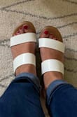 I think these shoes are super cute, especially for the summer! I love that they have a bit of cushion to them as well, my feet usually hurt with flat shoes but I haven't felt that at all with these. Definitely size down! I read the reviews before I purchased, so I bought a size 7 instead of my typical 7.5. They fit perfectly! - Amanda C.