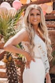 This dress was more than I thought it would be. I wore it for my bridal shower and the way it fits is so comfy and I got soooo many compliments on this dress. The back is laced and it is beautiful!! I dressed up the waist with a sparkly belt. - Heather G.