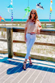 This piece is a chiffon dream! It beautiful and light. It is a bit cropped for those wondering. - Elizabeth C.