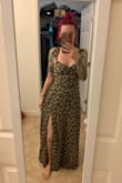 So cute! I love the little cut out detail on the front. No stretch at all so if you are between sizes go up! - Laura P.
