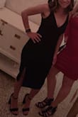 This dress is an absolute must-have! I loved it so much that I ordered it in red as well. I can't wait to wear it again! I am very short and the extra small was perfect in length. The slit on the side absolutely makes this dress. - Rebecca A.