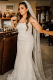 Loved this for my wedding gown! You would have never guessed it was from Lulus. The dress has a bit of sparkle that doesn't come through in the stock photos so it's definitely more beautiful in person. The back is also sexy. Also, there's no stretch so beware. - Cynthia M.