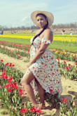 This dress is perfect, so romantic, I'm wearing a size Medium, is well made, make your body look good. I just love how it fits, the details, the flowers, the colors, the two split are perfect is never too late to get it. Great quality - Gloria Q.