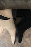 My true size is a 6, I ordered 2 pairs of ankle booties same size, the only difference was this pair has a heel and the other pair doesn't. The pair without a heel, fit perfect! But these are too small. And I'm really sad I can't exchange them for a bigger size. - Roseanna S.