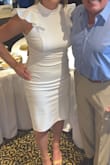 I absolutely love this dress! I wore it for my son's communion and received so many compliments! It's a very comfortable material. It's stretchy and fits nicely. I want to get this in all colors available! You can't beat the price!! - Laure N.