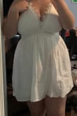 The dress was adorable and fits just as you would expect. It unfortunately didn't cover my boobs well enough (that isn't the dress's fault - I'm just a 34H, so I was not surprised by this). Heads up to ladies who are extra full in the bust, the side cut droops down a little when you fill the cup which made for unflattering side boob. Still a really pretty and comfortable dress and would absolutely recommend for the cute, delicate design. - Brooke J.