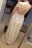 Bought this dress for my bridal shower, but could be a wedding dress for a more casual wedding. A lot fancier than I pictured it being with the lace. Needs to be shortened, or worn with higher heels. - Jean R.