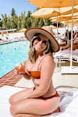 I was a little nervous about how I would look in orange, and that this suit has no padding, but I AM IN LOVE with it. This suit is so comfortable and cute, I would definitely buy again! - Olivia E.