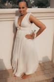 I wore this dress to a beach wedding. I had alterations done to the top and shortened the bottom a bit. The shoulder part is kind of loose fitting which it has plastic strips that helps with the shoulders slipping off but I wanted reassurance so I had it altered a bit. This dress was perfect for the occasion and I got lots of compliments. I would purchase again!! - Davana A.
