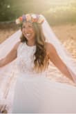 I wore this for my adventure elopement and loved it!! Had to get it hemmed but otherwise fit wonderfully! I wore one of those sticky backless bras and was pleased with how everything looked. - Jane E.