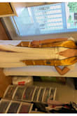 Initially I was a little upset because the "Our Love Song White Ruffled Wide-Leg Jumpsuit" (essentially the jumpsuit version of this dress but in white) was sold out, but I love this one too! I will be wearing this for my graduation this spring. The dress is slightly long on me, but I think wearing 3 in heels will be enough for the dress to stay off the ground for the most part. The main issue I have, is that the shoulders are a little too loose, so I'll need to pin it somehow. The four star rating is probably a little biased since I'm still thinking about the jumpsuit version if I'm being honest. The quality is really nice and I appreciate how it came with a dust bag. I also really like the ribbed front and the eggshell color.

PS. somehow the upload rotated my photo and made me crop my head and feet lol. Hope this picture helps. - Bernice Z.