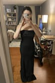 The Good: The dress fit perfectly on my top half and I loved the tule fabric on the bust; it's a very elegant dress that could be worn to a lot of different formal events. I wanted to wear it to a black-tie wedding, but for reasons below, I had to return it.
The Bad: The dress was super tight around the thigh area. Seriously, I thought it would be risky to bend over/sit down. If you're a pear shape like me, you may want to size up and get it tailored. The dress is also super long. I'm wearing heels in the photo, and there's a solid three inches of extra fabric on the floor. So if you're around my height (5'5), plan on getting the dress hemmed. - Lauren R.