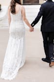 I wore this dress for our micro-wedding and am so happy with it! It's very form fitting, but in my experience it is true to size. It is long, so short girls like me should keep in mind that you'll probably need to get it hemmed. It was comfortable to wear all night and looked great in photos. Highly recommend! - Fiona G.