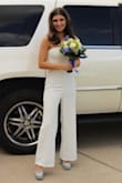 Great fit. Didn't slide down in the bust; fit nice & snug through there. Was a little long in the legs but a simple alteration fixed that. Danced all night in it! - Anna M.