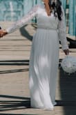 I am usually a size small but being 3 months pregnant I decided to get a medium, the dress was big but it was extremely easy to adjust the fit without professional help. I added a $20 belt from Amazon for extra sparkle. I got so many compliments on this dress! You will not be disappointed!! - Harley C.