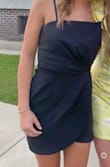 Fits like a glove! It's perfect for a cocktail party or anything like that. Love the details too! I got so many compliments on it!! - Sandy S.