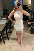 Planning to wear this for my rehearsal dinner and it's perfect. The fit is true to size and it's not too short! I love the lace pattern and the little strings on the bottom. (The strings do get messed up because of the bag the dress is shipped in, but they fill straighten out in time!) - Stephanie H.