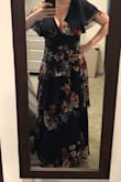 I was a little worried when I ordered this dress because I have a small frame but very large breasts so I usually run smaller like a medium. But, I got a large and it fit perfectly! The flowing material under the breasts makes it nice for people with not as flat abdomens (me) so spanx are not needed with this and it is very flattering. Another great thing is that a regular bra will fit with the dress so no need to buy a backless or strapless with this dress! - Carla D.