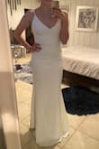 This dress is so flattering!! I'm 5'2 and 128lbs and I ordered a standard size small. I thought I might feel self conscious in my midsection with this style but I feel so pretty and confident in this dress! It's a slightly thicker good quality fabric that is comfy and flexible. It fits true to size and I'll just need to get it hemmed a few inches. I would definitely recommend! - Jasmyne C.