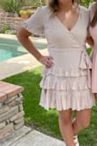 Overall this dress was just perfect! I wore it for my bridal shower and got so many complements on it! Goes a little low in the cleavage part so I just pinned it a little and worked great! - Lauren
