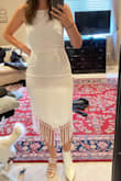 This dress fit even better than I thought it would! It's tighter in the waist and on my back side, but looser up top for a casual look. Thick enough fabric so that it's not see through, but still light weight! Good amount of stretch. - Emily S.