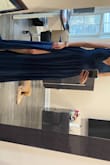 I bought this dress last minute for my engagement pictures! Loved it. The fit was great, the bust area was a little loose but a pin did the trick and I don't think I'd want something much tighter. It was perfect in length. A beautiful color, shine, and material. Loved it and definitely worth it! - Priyanka S.