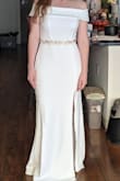 Ok so: after getting jerked around from another large bridal shop that shall not be named, I panicked and bought this dress that looked rather similar. I literally could not be happier with it -- it's very light (a big deal for me!), fit  nearly perfectly (it's a bit long, maybe an inch or so with my heels, but the seamstress who took a look at it was like, "eh, this clearly isn't hurting the look and you seem happy). I don't need any other alterations! In the picture, I am wearing my heels (2.5 inches)  and a belt. - Lauren P.