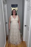 I love this dress and even if I decide to use something else for my wedding, I can always remove the overlay and have it hemmed to a cocktail length. I'm very happy with my purchase. I was told that it makes me look like a princess - Rachel F.