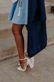I wore these for my college grad photos & will also be wearing them at graduation. They were pretty uncomfortable at first, but once I broke them in, I didn't have any issues! (I wear a 7.5 and bought a 7.5 for reference) - Kiana D.