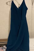 Fits exactly like the picture. Was skeptical about ordering this but was not disappointed! This is the perfect dress for any occasion! - Bailey D.