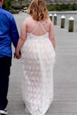Fits good, it's definitely long though, I had it altered to use the extra fabric as a small train, first dress I ordered the strap snapped off but customer service was great quickly sent me another dress. - Kaitlynn C.