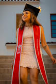 This dress is seriously so adorable. I loved the soft pink color! It went super well with my graduation gown and matched pretty well with my stole! My only complaints are that upon opening the packaging that contained the dress, it had a STRONG smell. I'm not even sure how to describe it, other than, maybe... factory-ish? I ordered two colors of the same dress and the yellow colored one did not smell this way. I imagine it must have been the dye or something. Secondly, the sizing seems to be a bit off for the dresses. I ordered the pink extra small and the yellow in a small. The small yellow was too big and the extra small fit me like a small usually does. Not a total deal breaker in any way, just thought I would mention it! All in all, I would totally purchase this dress again. - Corrina L.