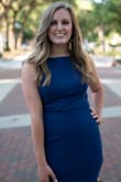I wore this dress for my graduation pictures... it was perfect! I maybe could've gone a size down (as shown by the wrinkles in the pictures), but I'm not comfortable with really tight dresses so I thought the fit was great! Very comfortable and attractive - Clarice S.