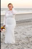 The Dress was absolutely beautiful. Very well made. Runs a little big. Material has lots of stretch. The company was fast with shipping and the package arrived beautifully. Dress came with a hanging bag. I would highly recommend this company. - Shannon E.