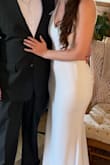 I needed to find a dress for our elopement ceremony and this was perfect! The material is thick and high quality. The adjustable straps were so helpful (as I'm not very busty and have an hour glass figure - wide hips!).
While the size Small did fit, I have endometriosis and deal with excessive bloating (endo belly) and I personally don't like things fitting too tight on my lower abdomen/pelvic area and that's why I ultimately chose to wear the Medium. I thought it fit perfectly/comfortably honestly.
After reading reviews, I agree - getting a strapless bra and Spanx (to smooth things out if desired) would be helpful! I didn't wear Spanx, but I did get one of those adhesive bras and that was a great decision!
I love this dress so much, I may actually wear it to our vow renewals/reception with friends and family! - Sara T.