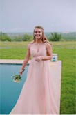 I wore this dress to my senior prom and I absolutely loved the dress. It was simple but elegant. It was a little long on me but I got it hemmed. - Lauren B.
