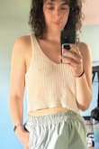 I loved the cut and fabric of this top - it's so soft, and the back is SO sexy and cute in person. I think you definitely can't wear it with a bra though (at least I don't really want to), and it's definitely see-through. I really, really wanted it to work - I may exchange for the sage green because other than my nipples showing it was great! (and honestly I thought about keeping it anyway, but my fiancé pointed out that while I *want* to be someone who's comfortable with having my nipples out in public, I'm just not. It's me, but if you're cool with it I say GO FOR IT!!) - Lucy W.